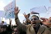 Protests against the regime have brought a halt to work in Libya.