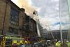 Firefighters tackle the blaze at the Mac