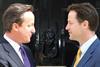 Cameron and Clegg shake hands