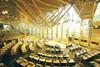 The debating chamber contains seating for 128 members. Their oak and sycamore desks  were designed by Enric Miralles and incorporate a voting console and lectern.