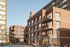 A four-storey infill block designed for Camden council's Tybalds Estate by Matthew Lloyd Architects