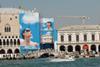 Ad billboards cover the facades of Doge's Palace in Venice.
