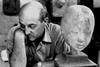 Isamu Noguchi in the sixties with sculpted head of Japanese girl