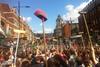 Brooms aloft for the riot clean up in Clapham