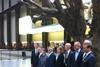 Tate Modern launch - dignitaries pose for the press in front of Ai Weiwei's tree in the Turbine Hall