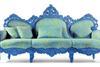 Designer Alessandro Mendini’s hand-carved wood Murillo sofa with silk upholstery for Byblos.