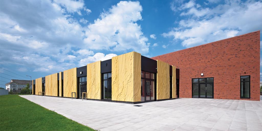 Community hub's concrete cladding echoes industrial past | Technical ...
