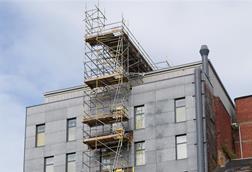 Scaffolding to facilitate work being done to the top of a high rise building