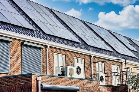 Heat pump technology in row of houses credit Shutterstock