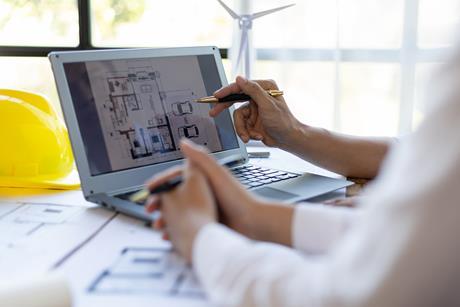 architect-and-engineer-discuss-building-blueprint-2025-09-08-10-45-59-utc