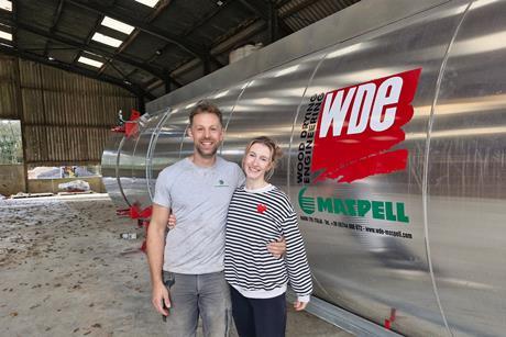 Tom and Polly Bedford with the new Thermo Vacuum System machine which has just arrived at UK Hardwood's South Molton sawmill