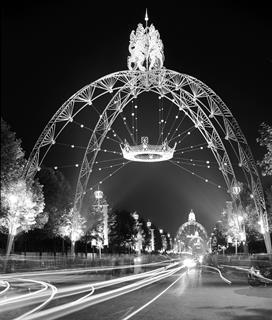 Ceremonial arches over The Mall for the Coronation of Queen Elizabeth II, London, seen at night