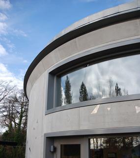 A large "letterbox" was cut into one of the precast panels to create a panoramic window
