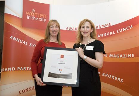 Cathy Stewart (left) from PRP Architects wins the Built Environment category at the Women in the City Awards, presented by Rachael McConaghie, chairman of Women in Property