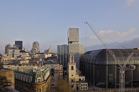 The building fills its irregular T-shaped site, rising behind the spire of Wren’s St Stephen Walbrook church.
