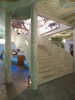The concrete stair at the heart of the restaurant.