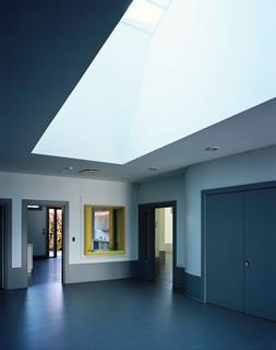 The deep reveals of the roof lantern form reflect light around the entrance.