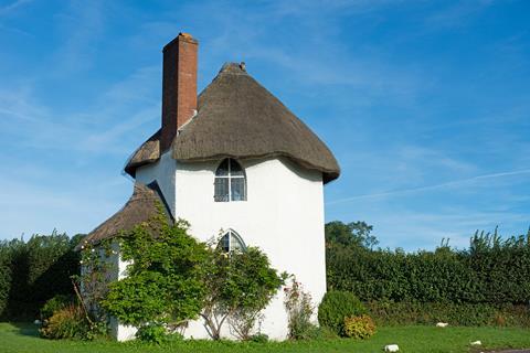 shutterstock_Thatched high rise cottage