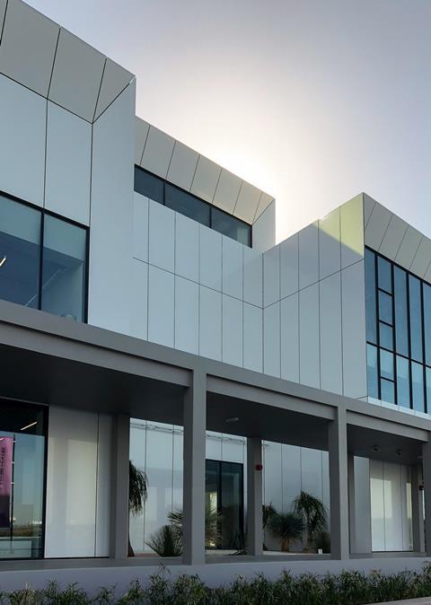 Serie Architects' Jameel Arts Centre. The library and offices look north over Dubai Creek