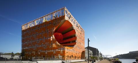 The Orange Cube building designed by Jakob & MacFarlane, at Lyon's La Confluence regeneration district