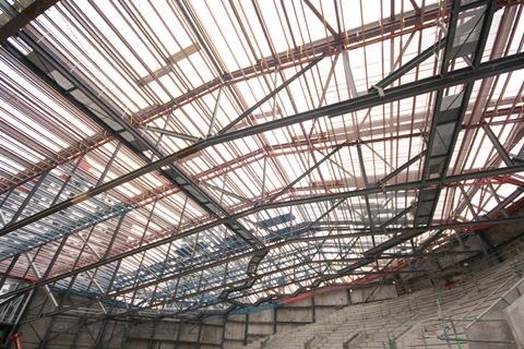 Roof trusses were assembled on site and continuously installed over 75 hours.
