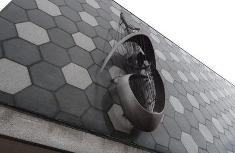 Man Aspires by A J Poole, which is on the side of Freedom House in Basildon, Essex