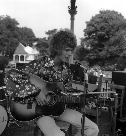 David Bowie in concert at the bandstand in Beckenham in August 1969. PLEASE NOTE: Image license period ends 16th September so this image is not to be used in news pieces after that date. Image is also not t