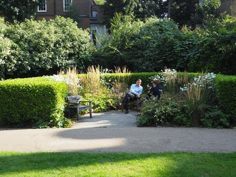 Seating and hedging in St George's Gardens, Bloomsbury