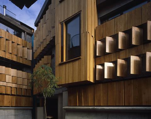 Walmer yard by peter salter courtyard detail of shutters partially open photography helene binet 1500