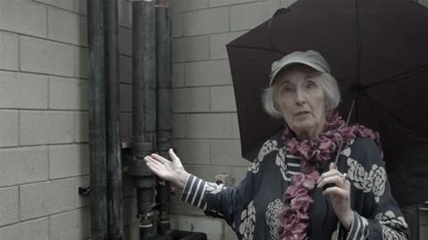 Kate Macintosh points out the new pipes in a screenshot from Tom Cordell's film Macintosh Court - the story so far
