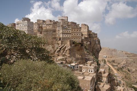 Traditional Sanaa buildings in Yemen's mountainous landscape