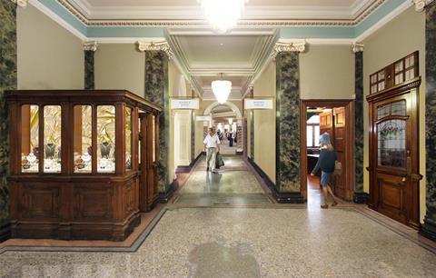 Inside Fulham Town Hall - visualisation of arcade and hub by Tony Fretton Architects