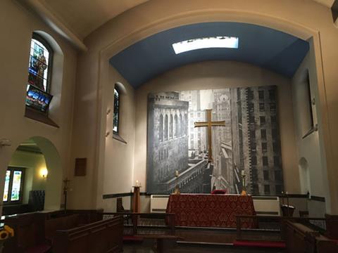 Mural at the east end of Christ Church Southwark, depicting the cross in the thick of a densely urban scene