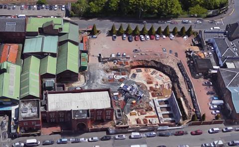 Aerial view of Masjid Noor Mosque in Glasgow. The new extensions are proposed for its frontage and the cleared area to the side.