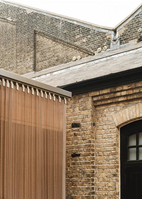 Detail of the mesh curtaining at Haworth Tompkins' temporary pavilion for theatre company Punchdrunk's Woolwich Works HQ